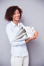 Afro american woman standing with folders Royalty Free Stock Photo