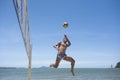 Afro Brazilian man plays foot volley