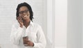 Afro Business Lady Having Phone Conversation Drinking Coffee Against Wall Royalty Free Stock Photo