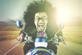 Afro businessman riding motorcycle