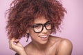 Afro girl in eyeglasses, smiling. Royalty Free Stock Photo