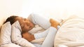 Afro Girl Sleeping Hugging Blanket In Bedroom In Morning, Panorama