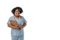 portrait of happy young afro latin woman doctor smiling and holding closed brown folder, copy space Royalty Free Stock Photo