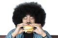 Afro man eating a delicious hamburger Royalty Free Stock Photo