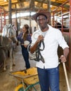 Afro man horse farm worker Royalty Free Stock Photo