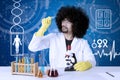 Afro researcher examining microscope slide Royalty Free Stock Photo