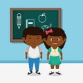 Afro school kids couple with chalkboard Royalty Free Stock Photo