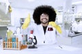 Afro scientist showing thumbs up