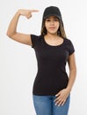 Afro woman in black template t shirt and baseball cap isolated on white background. Blank Sport hat and tshirt. African american Royalty Free Stock Photo