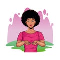 Afro woman doing breast self exam pop art style