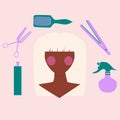 Afro women with blond hair,pink cheeks.There are hairdressing tools hair spray,scissors,brush,straightner around her head.Pink