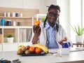 Afroamerican nutritionist looking at camera