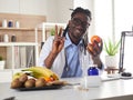 Afroamerican nutritionist looking at camera