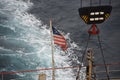 Aft part of the empty cargo container vessel with Liberian flag underway Royalty Free Stock Photo