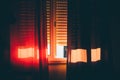 Orange Hues: Sunlit Bedroom Interior Royalty Free Stock Photo