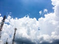 Afternoon blue bright sky full of huge white fluffy clouds Royalty Free Stock Photo