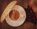 Afternoon espresso and biscotti on weathered wood. Royalty Free Stock Photo