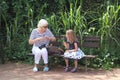 Afternoon with a grandmother - small girl with her grandmother at a park