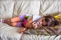 Afternoon nap baby napping child couch bedtime sofa lullaby Royalty Free Stock Photo