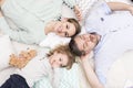 Afternoon nap next to his most beloved women Royalty Free Stock Photo