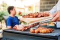 Afternoon Party Group friends enjoying drinking beer with barbecue and roast pork happy while enjoying home party Royalty Free Stock Photo