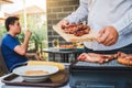 Afternoon Party Group friends enjoying drinking beer with barbecue and roast pork happy while enjoying home party Royalty Free Stock Photo