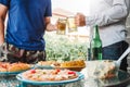 Afternoon Party Group friends enjoying drinking beer with barbecue and roast pork happy while enjoying home party Royalty Free Stock Photo