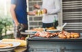 Afternoon Party Group friends enjoying drinking beer with barbecue and roast pork happy while enjoying home party Royalty Free Stock Photo