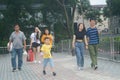 Shenzhen, China: In the afternoon, pedestrian landscapes on footbridges include off-duty men and women, workers, tourists and so o