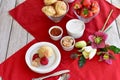 Easter breakfast brunch with homemade biscuits jam and clotted cream