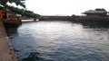 Afternoon sea view and sea-wall, beach, and coral, sunset background Royalty Free Stock Photo