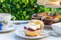 Afternoon tea with cakes and traditional English scones