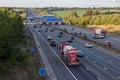 Afternoon traffic on the British motorway M1 near junction 9 and village Redbourn