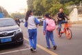 Shenzhen, China: two primary school girls go home on their way home from school