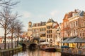 Afternoon view of the Nieuwe Rijn canal with bridge and historic buildings in the city center of Leiden