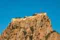 Afyon castle on the rock in Afyonkarahisar Turkey in front of a sunny blue sky Royalty Free Stock Photo