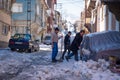 Afyonkarahisar/Turkey - January 11 2020: Men shovel snow on the street