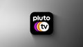 Agadir, Morocco - April, 2023: In this photo illustration Pluto TV application is displayed on gradient background