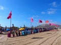 Red flags on beach in travel Agadir city in Morocco