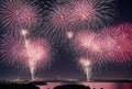 Against the backdrop of the night sky, bursting fireworks create a mesmerizing spectacle, their brilliant explosions Royalty Free Stock Photo