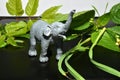 African elephant raised trunk, children`s toy