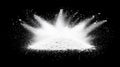 Against a black background, an explosion of white powder creates a design and texture Royalty Free Stock Photo