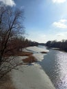 Against the blue sky, melting ice on a spring river Royalty Free Stock Photo