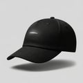 Against a light gray background. The cap features a smooth, curved Royalty Free Stock Photo