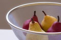 Against the light view of a closeup of four organic pears