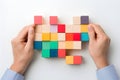 Against a neutral background, a hand arranges colorful sticky notes. AI Generated Royalty Free Stock Photo