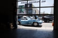 Blue Corvette Stingray convertible outside Walt Grace in Miami.