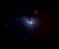 An astrophotographic image in outer space of the Orion nebula in the constellation of Orion appears in the winter night sky. Royalty Free Stock Photo