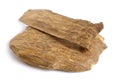 Agarwood, also called aloeswood oudh, isolated on white background