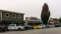 AGASSIZ, CANADA - August 18, 2018: main street in small town in British Columbia with shops restaurants cars.